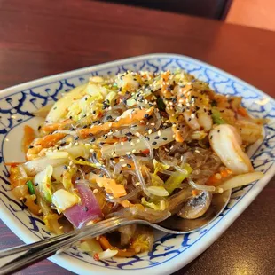 Jap Chae.  Looks Good But The Main Flavor Was Heat.  I'd Go  No Sesame Seeds.  3 Out Of 5 Spice Level Was A Bit Much For Me.