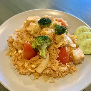 a plate of rice and vegetables