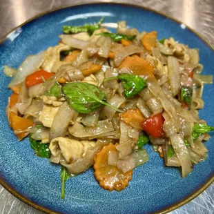 a plate of stir fried vegetables