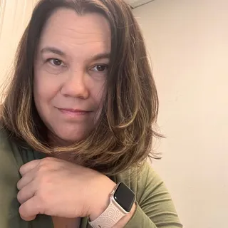 Dela M.
