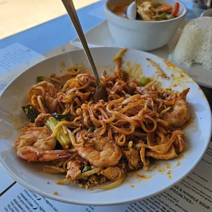 a plate of noodles and shrimp