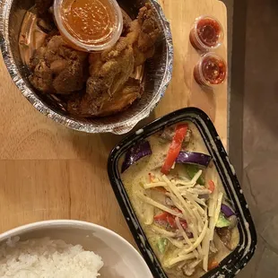 a bowl of rice and a bowl of chicken