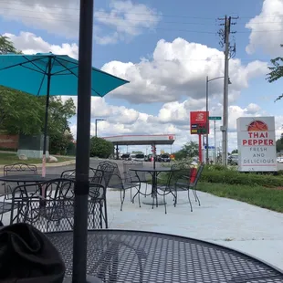 Sitting on their little patio (there's only a couple spots to park in back if you choose this unless you walk here).