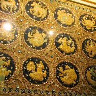 interesting astrological (?) wall hanging in downstairs dining room