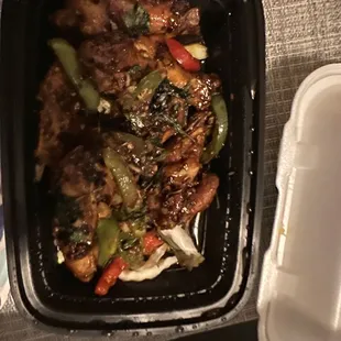 a takeout container of food