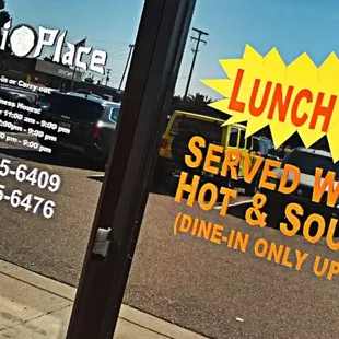 a sign for lunch special served with free hot soup soup