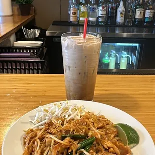 Lunch small portion chicken pad that with Thai coffee.