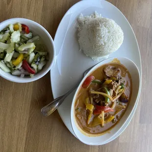 Cucumber salad, and red curry with beef. Yum! Many gluten free options.