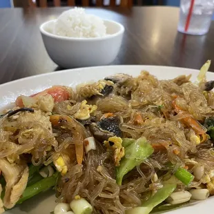 a plate of noodles and vegetables