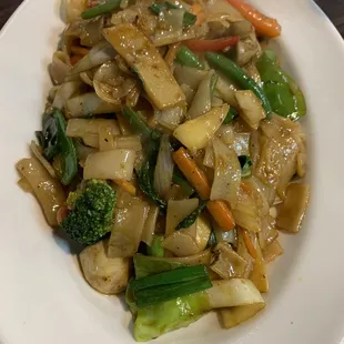 a plate of stir fried vegetables