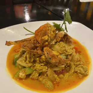 Crab curry with soft shell crab on top.