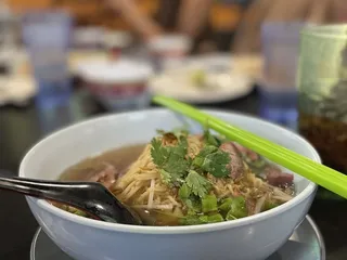 Crispy Pork Gang Oyster Bar & Crawfish Thai Restaurant