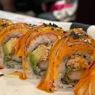 X-Men Roll IN: Shrimp tempura, spicy crab mix, and avocado OUT: Crab stick, eel, and spicy mayo