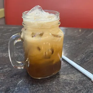 a drink in a mason jar