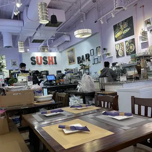 Cashier, packing area, kitchen behind back wall