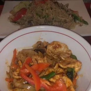 Spicy hobo noodles with chicken and basil fried rice with beef (in the back)