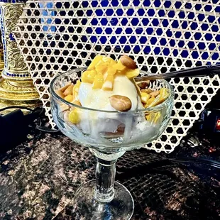 Coconut  ice cream with Jackfruit , sweet corn, cooking milk and roasted peanut !