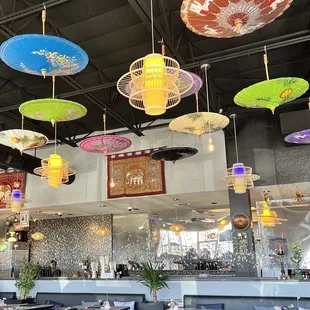 colorful umbrellas hanging from the ceiling