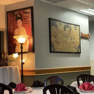 a dining room with white tablecloths and white tablecloths