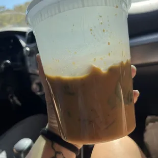 Half full?  Last time I could barely open it without it spewing out of the top. What is going on?