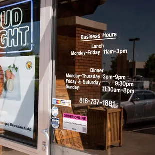 a sign in the window of a restaurant