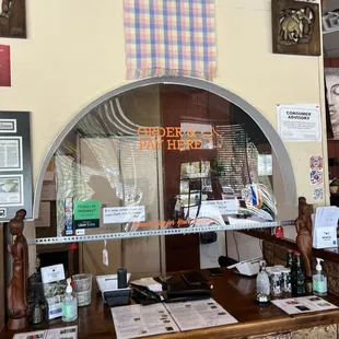 the counter and umbrellas hanging from the ceiling