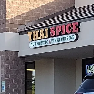  car parked in front of a restaurant