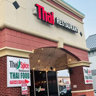 the entrance to a thai restaurant