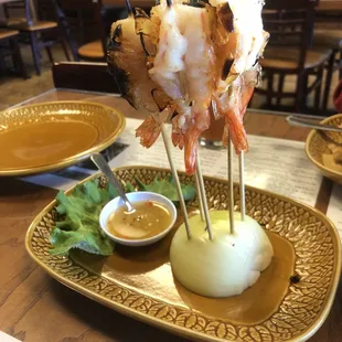 15. Goong Phao grilled jumbo prawns on skewers served with Thai spicy sauce