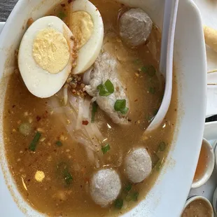 I can't remember what is called. On the back of the menu with chicken meatballs and a chicken pattie. Ridiculously good!