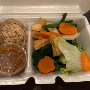My delicious leftovers. Peanut sauce has a kick, and veggies were pert and lovely.