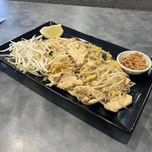 a plate of food with noodles