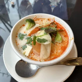 a bowl of soup on a plate