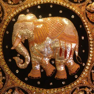 an elephant with gold decoration