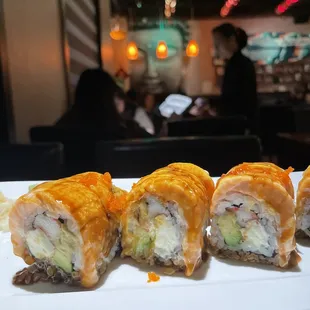 Yummy Roll--crab, cream cheese, avocado inside baked salmon, spicy mayo, eel aauce
