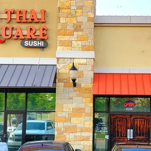 Wooden doors are entrance to foyer, Suite J.
