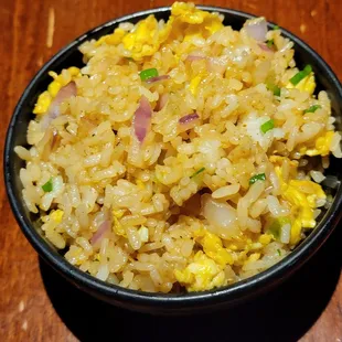 Fried rice, light seasoning, minced onions, scrambled egg.