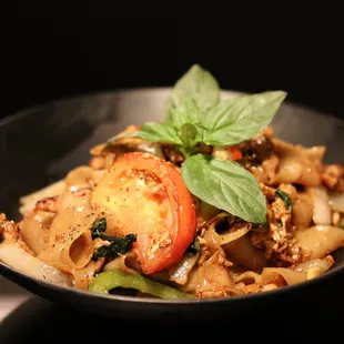 Drunken Noodle ($8.95): Pork, Basil, Tomatoes, Mushroom, Onions, Bell Peppers, Egg, Garlic, Pepper &amp; Oyster Sauce. Delicious!