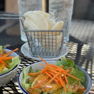 Complementary salad and shrimp chips for lunch