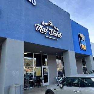 the entrance to a thai street restaurant