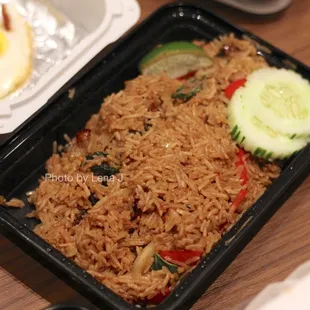 Basil Fried Rice Pork Belly ($15) basil, onion, bell pepper, young peppercorn, plus Fried Egg (+$2) (Spicy 3)
