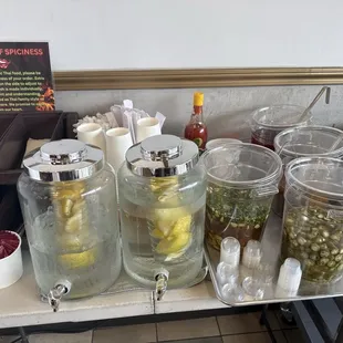 Condiments, utensils and water