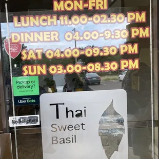 a sign in the window of a restaurant