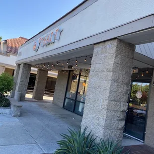 the front entrance of a restaurant