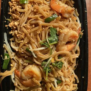 Shrimp pad Thai. Unimpressive,  or enough sauce, few bean sprouts, overcooked and sticky noodles.