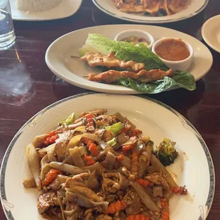 56. Pad See Yew 51. Rama Spinach Curry and 8. Chicken Satay