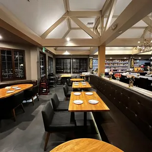 a restaurant with tables and chairs