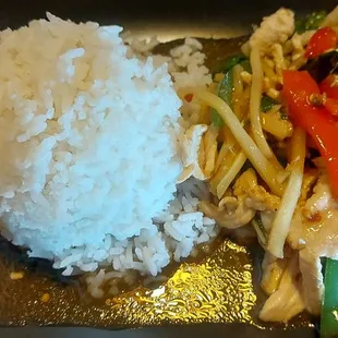 Wok fried chicken with bamboo shoot and Basil, served with steamed rice.