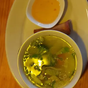 Veggie soup with fried spring roll and dipping sauce