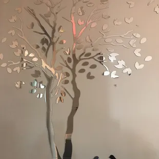  a tree with birds in it